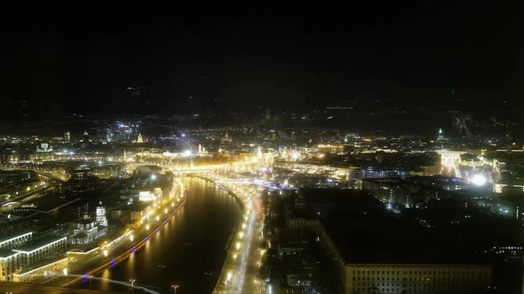 Timelapse of Calm River with Embankment in Large City