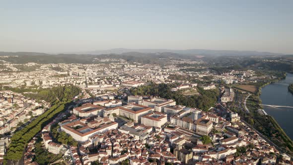 Aerial panoramic view of Coimbra and surrounding landscape, Portugal. Sky for copy space