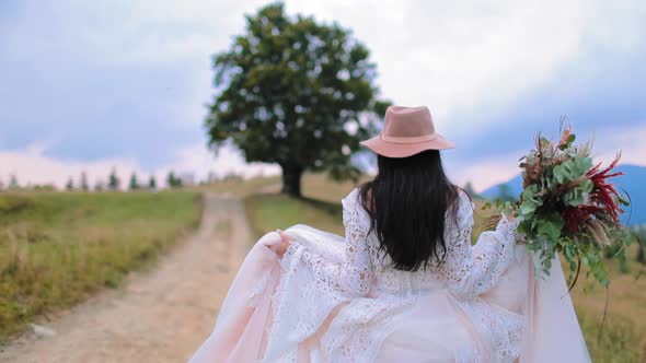 Bride walking in nature