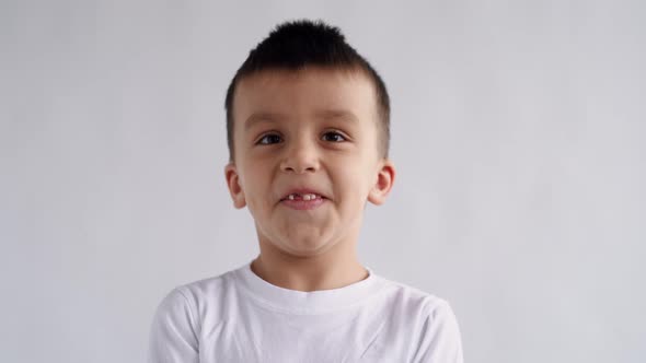 Portrait Little Boy Looking at Camera Young Laughs Happily Child with Glasses Looking at Camera