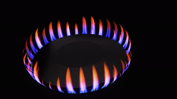 Natural gas stove being turned off. Termination of gas supply, economy, sanctions concept.