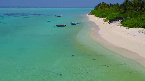 Drone panorama of lagoon beach time by blue sea with sand background