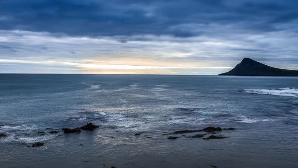 Sunrise over the coast and cliffs in Iceland alt
