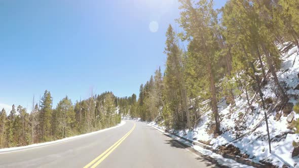 POV point of view -Driving through Rocky Mountain National Park in the Spring.