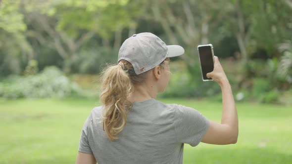 Woman Hiking In The Park