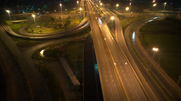 4K : Aerial drone hyperlapse video of elevated toll road junction