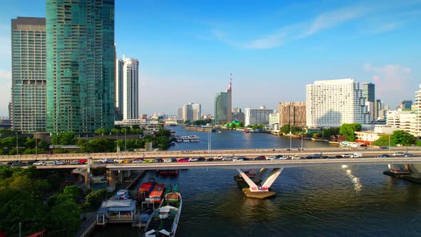 4K UHD : Bangkok River drone view. Flying over the Chao Phraya River