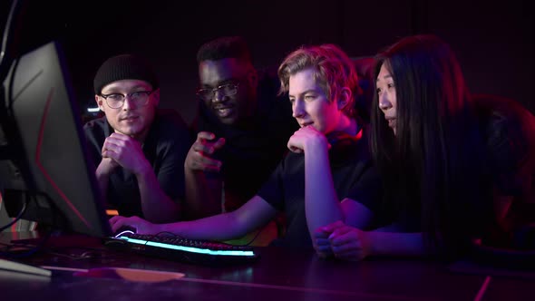 Players of the Esports Team Gathered Together in the Computer Club and Watch the Stream From the
