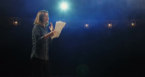 Actress Rehearsing in a Theater