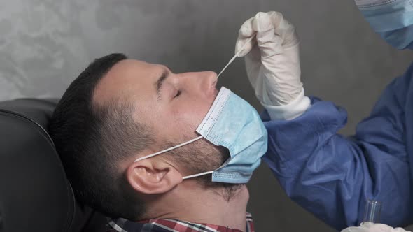 A medical worker takes a corona virus sample for PCR at a hospital.