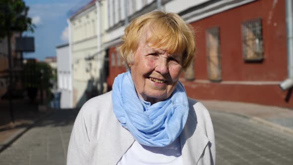 Elderly Woman Smiling Portrait Outdoors