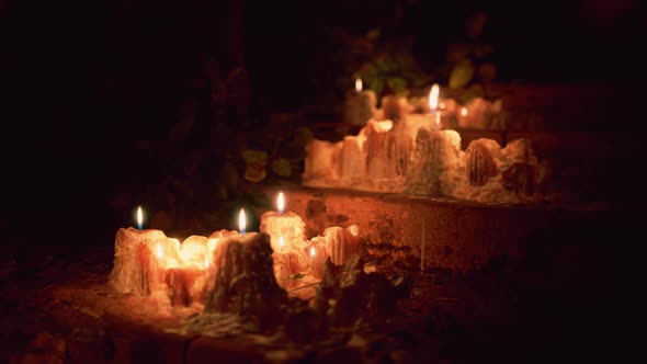 Candles Burning in the Dark