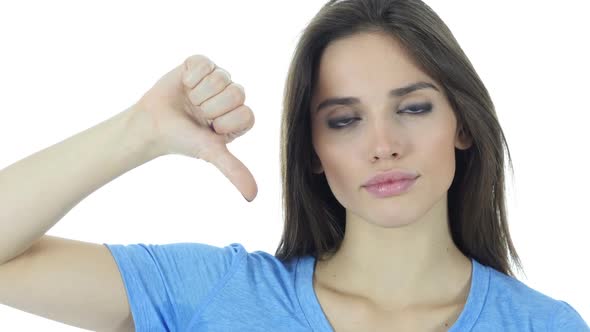 Thumbs Down By Beautiful Brunette Woman