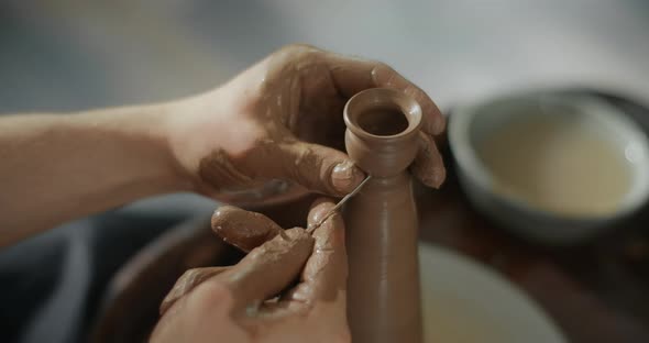 Potter Sculpts a Small Ceramic Glass in Slow Motion on a Potter's Wheel Small Forms in Pottery