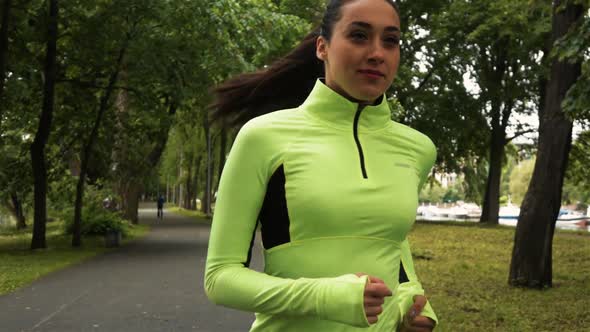Runner Woman in Green Blouse