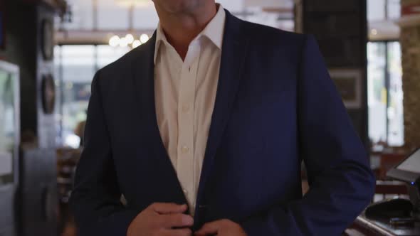 Caucasian man in blue suit