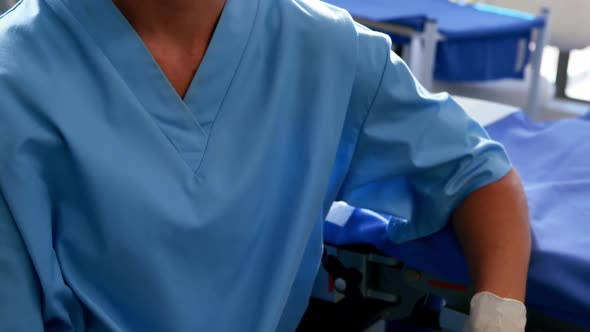 Female nurse in surgical mask at operation theater