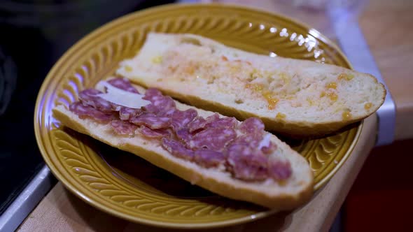 Preparing a Crusty Baguette Sandwich