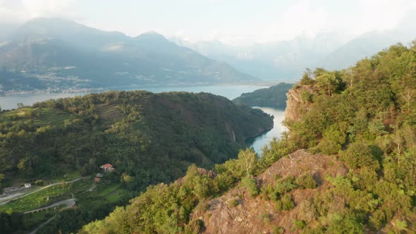Fly Over a Mountain with Multilevel Grape Vines Fields and Opening of Amazing View on a Como Lake