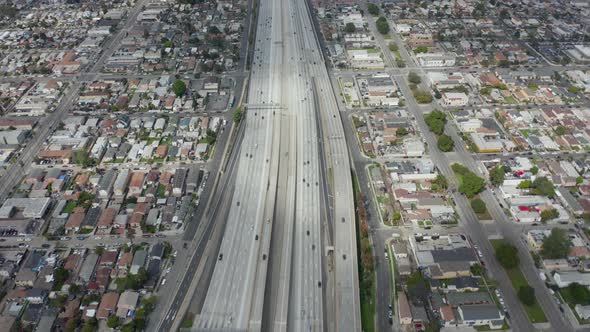 AERIAL: Slow Overhead Lookup Over 110 Highway with Little Car Traffic in Los Angeles, California on