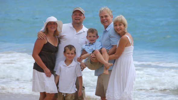 Portrait of multi-generation family at beach