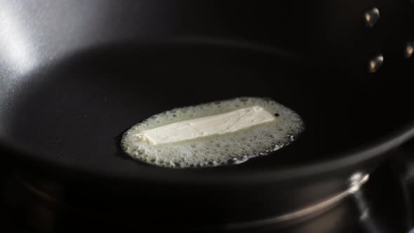 Frying Burger Bread in Pan Closeup