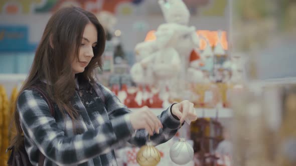 Pretty Woman Buying Christmas Decorations