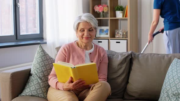 Old Woman Reading Book and Housekeeper at Home