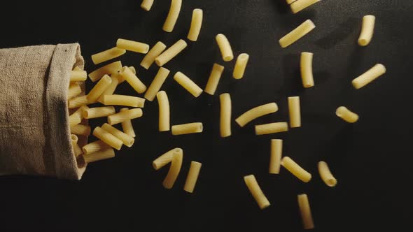 Bag falls and tortiglioni are poured out of it