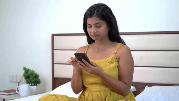 Disgusted Indian woman shopping online