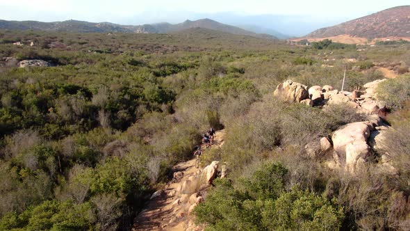 4K Mountain Bikers Competition Cycling Through Canyon Trail