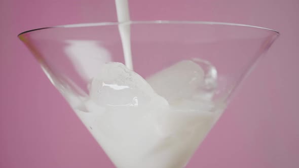 Milk being poured in glass