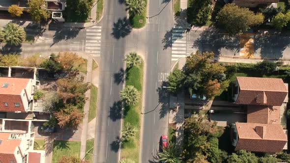 Ascending Aerial Drone Shot of road in residential area