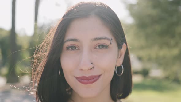 Happy woman looking at camera