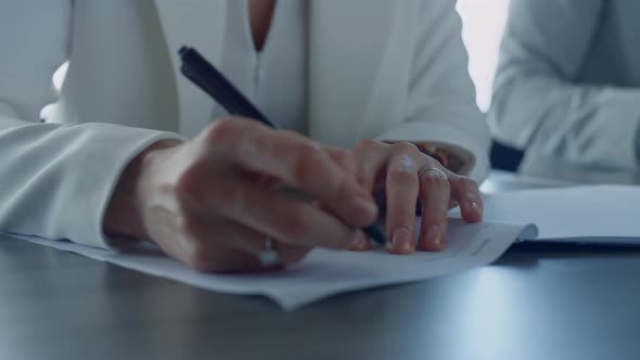 Closeup Hand Holding Pen