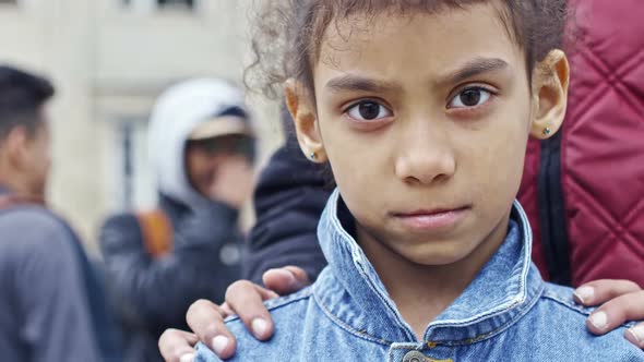 Refugee Girl Looking into Camera