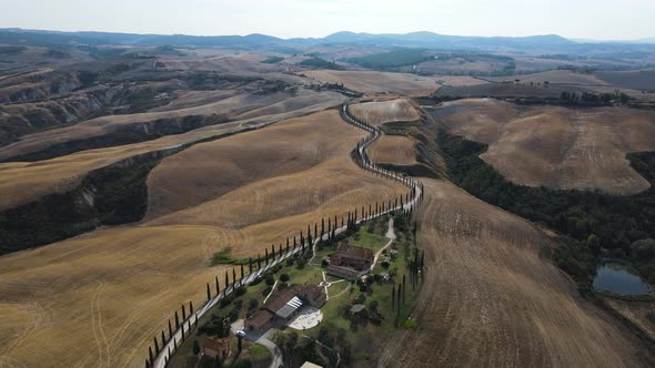 Aerial view of Val d'Orcia countryside landscape in Tuscany, Italy.