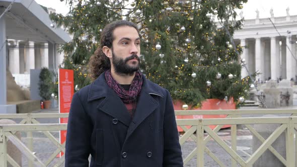 Handsome Young Man Looking Around in The City