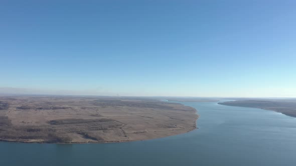 Blue river Danube waters by the day 4K aerial footage