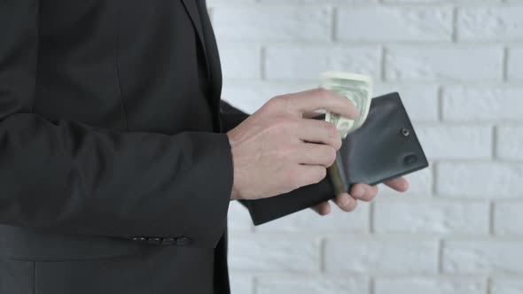 Businessman with an empty wallet.