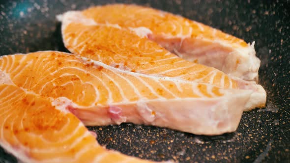 Fillet of Red Fish is Fried in a Pan