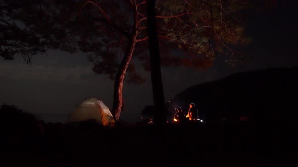 Camping By the Sea at Night