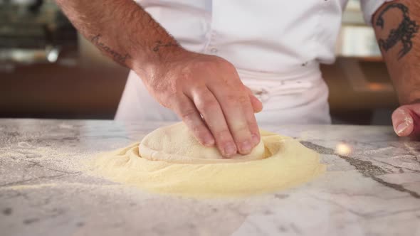 Italian Chef Making Dough for Pizza Traditional Food Man Working in Restaurant Kitchen High Cuisine