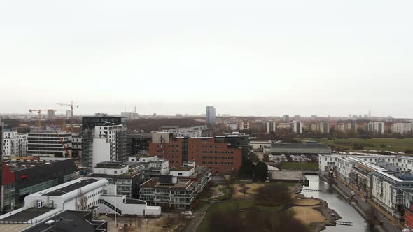 Aerial forward ascending over suburb of Malmo city, Sweden