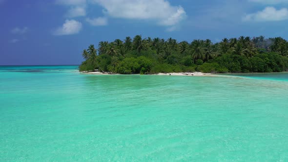 Luxury drone copy space shot of a sunshine white sandy paradise beach and turquoise sea background 