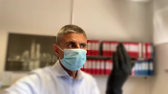 Man Looking Around in the Office Wearing Mask During Coronavirus Outbreak Slow Motion