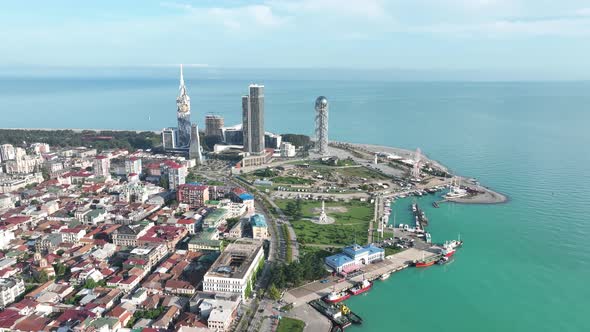 Aerial view of Chacha tower with big clock and cityscape of Batumi city