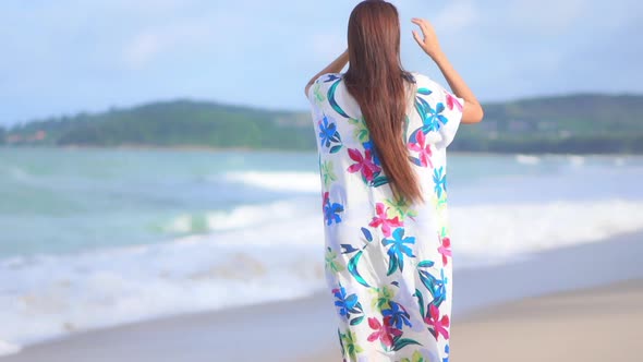 Asian woman enjoy around beautiful beach sea ocean