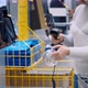 A Woman Scans Goods at the Selfservice Checkout - VideoHive Item for Sale
