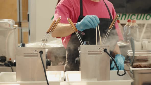 French Fries Cooking on Deep Fryer on Festival